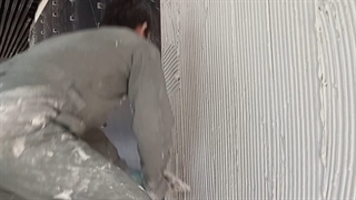 ماله کشی قبل از نصب اسلب با چسب پودری پرسلانی